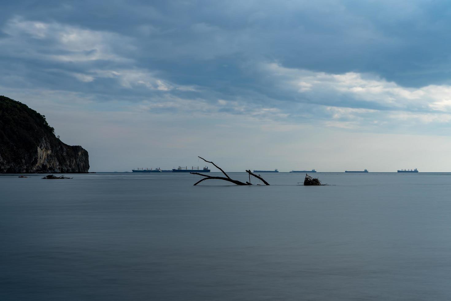 Seascape with ships on the horizon. photo