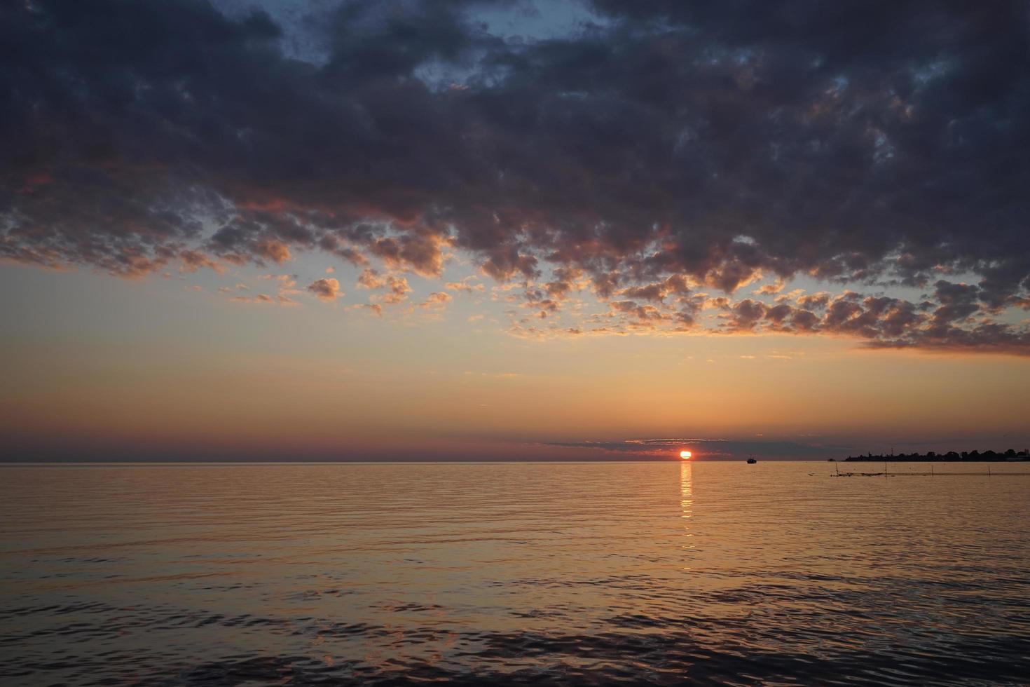 Beautiful dramatic sunset against the sea. photo