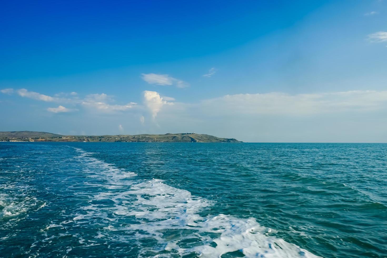 Seascape with a view of the coastline of the Kerch Strait. photo