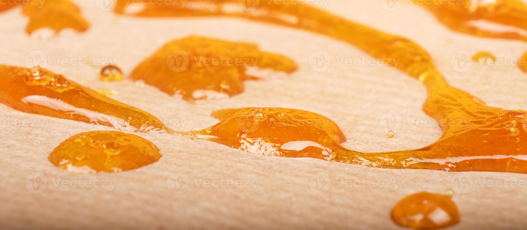 strong extract of gold cannabis wax with high thc close up photo