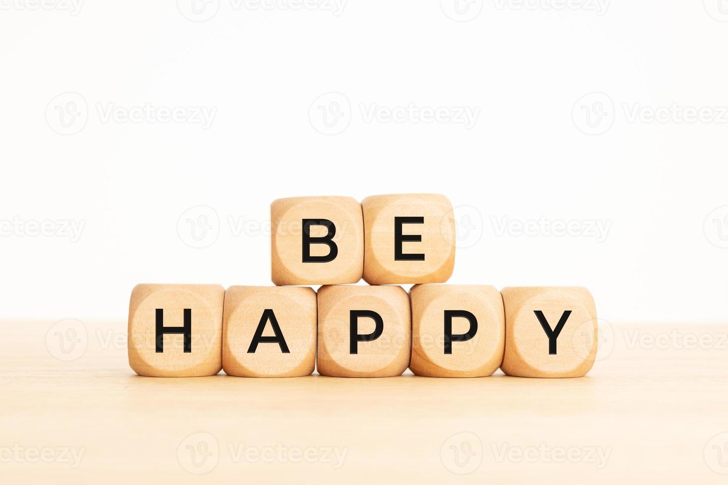 Be Happy phrase on wooden blocks. Copy space photo