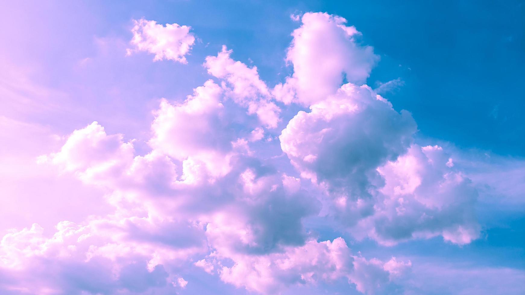 Cloudy pink and blue color background photo