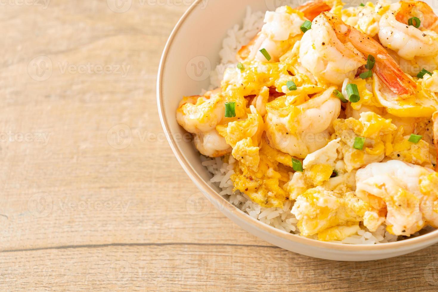 creamy omelet with shrimps rice bowl photo