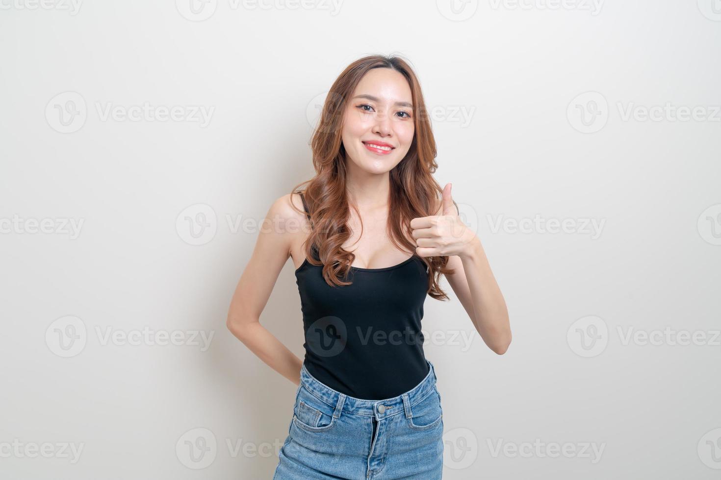 portrait beautiful woman with hand show ok or agree hand sign photo