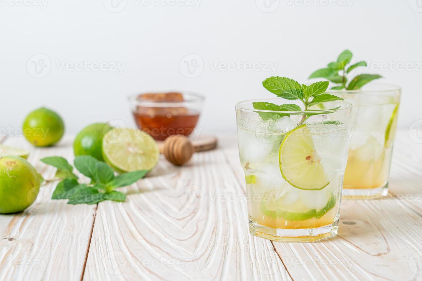 iced honey and lime soda with mint photo