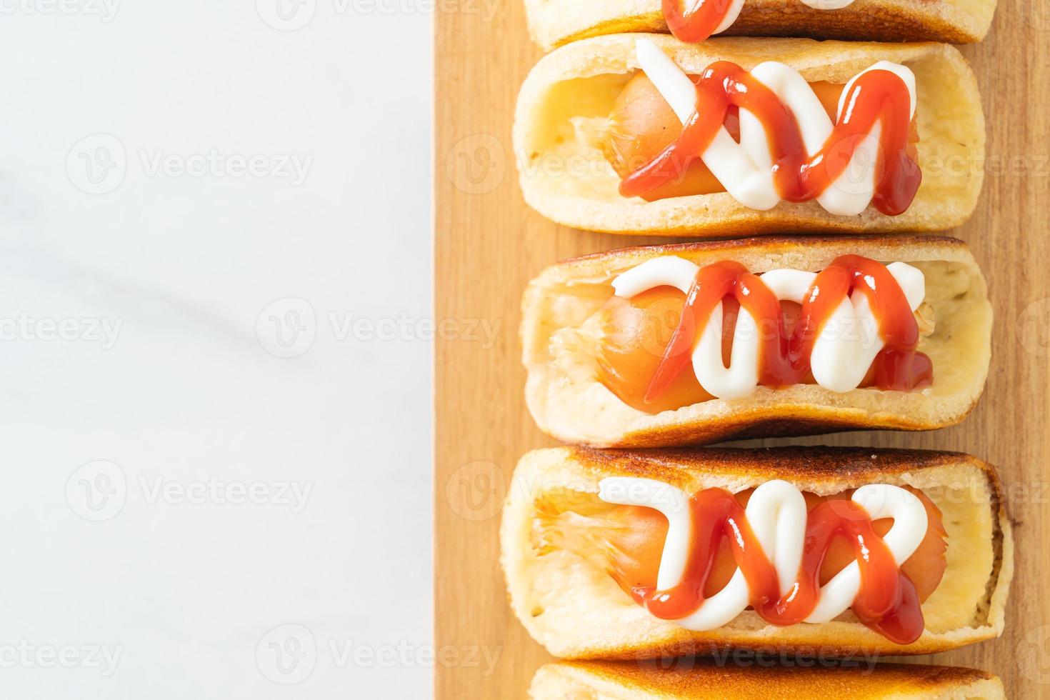 flat pancake roll with sausage photo