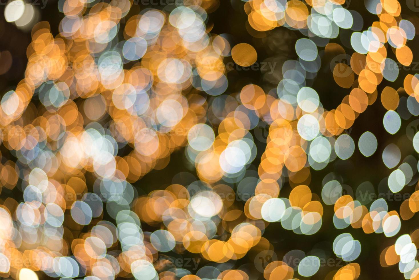 Blue and yellow abstract blurry light bokeh background photo