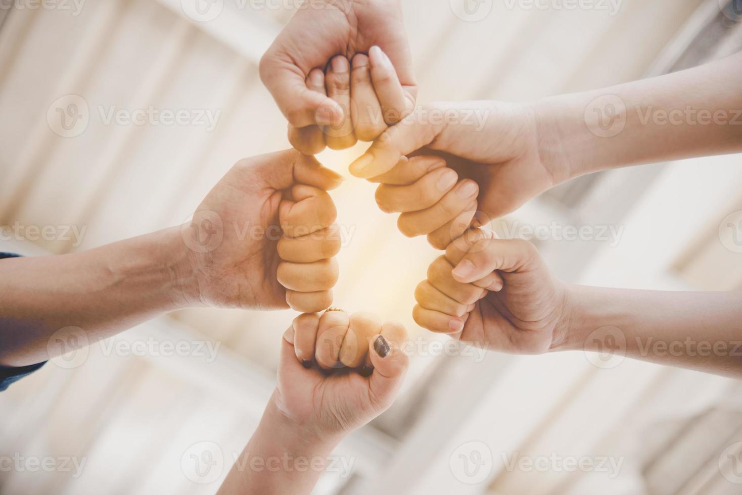 Fist Bump of friendship and teamwork for startup new project photo