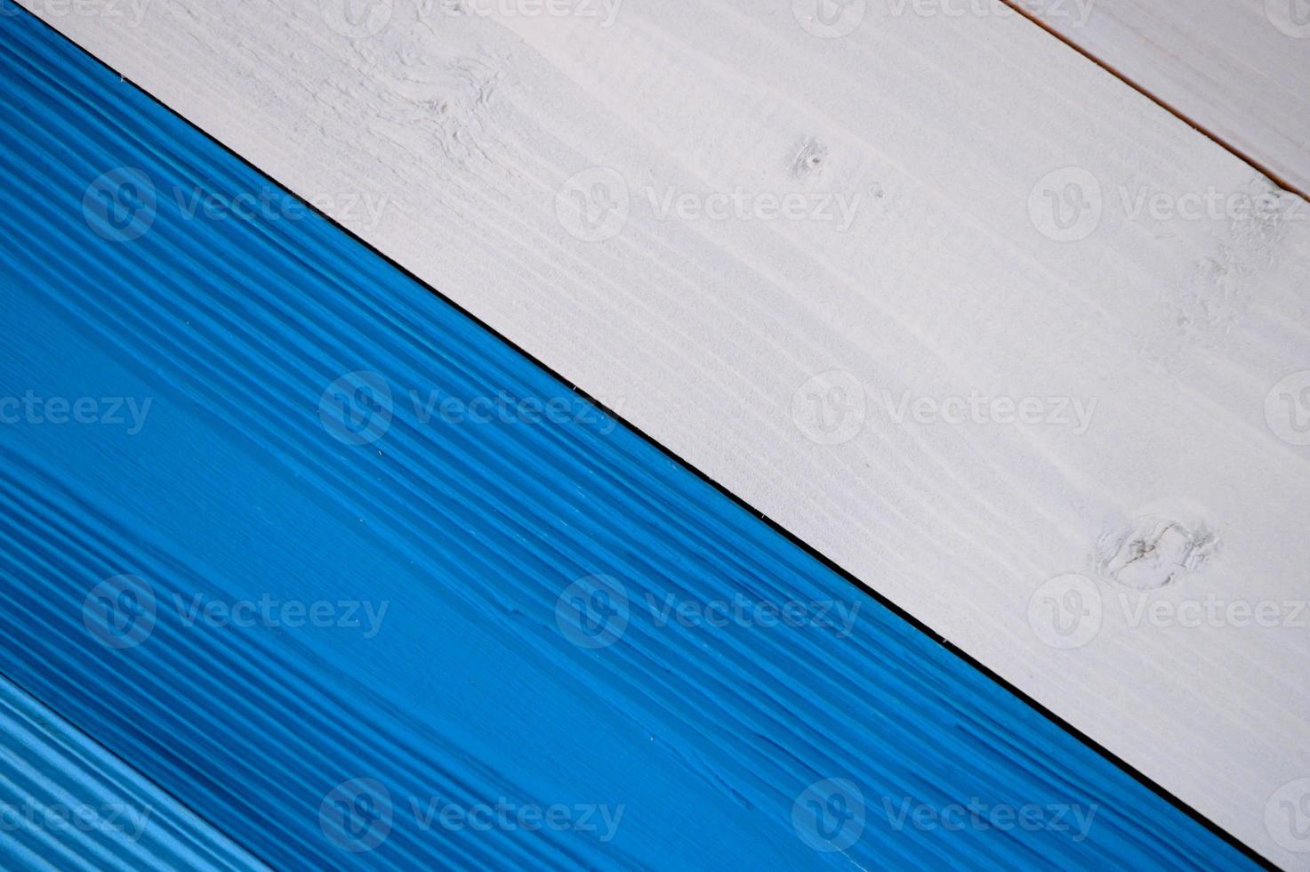 Top diagonal view of blue and white wooden textured background photo