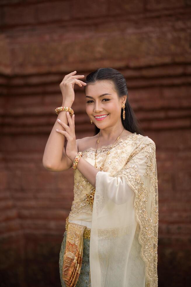 Beautiful Woman wearing typical Thai dress photo