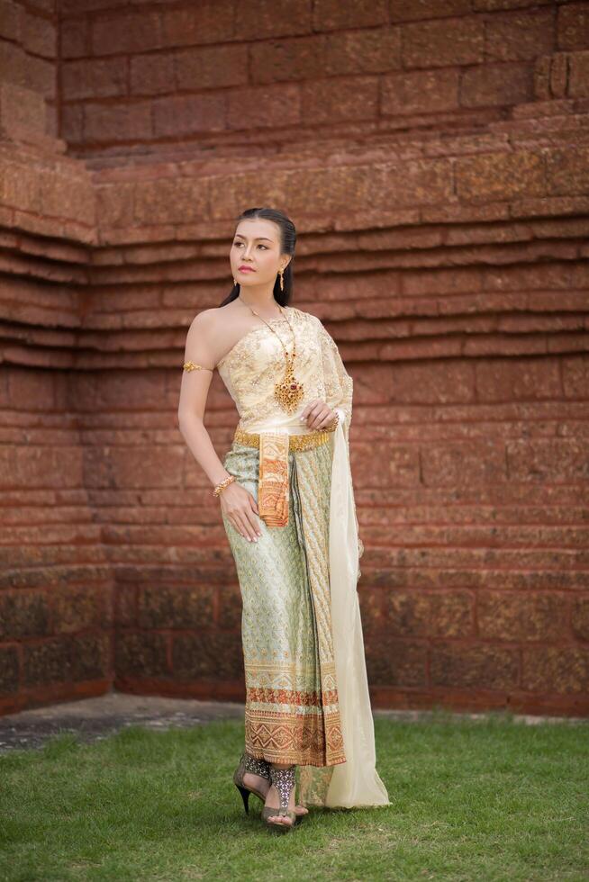 Beautiful Woman wearing typical Thai dress photo