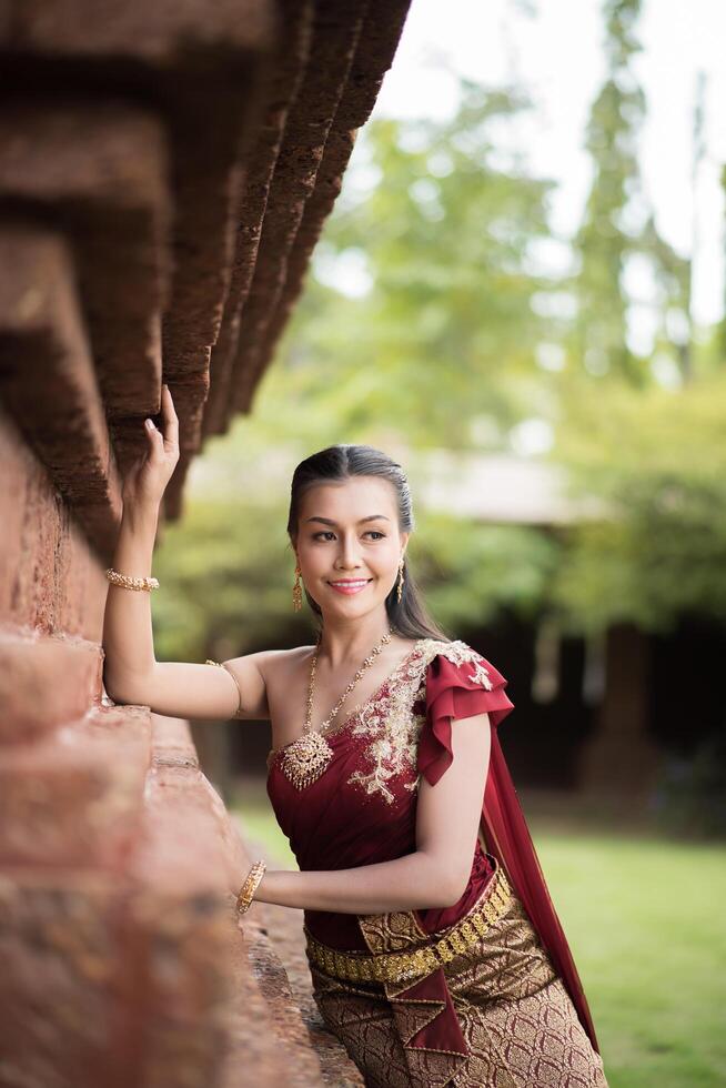 Beautiful Woman wearing typical Thai dress photo