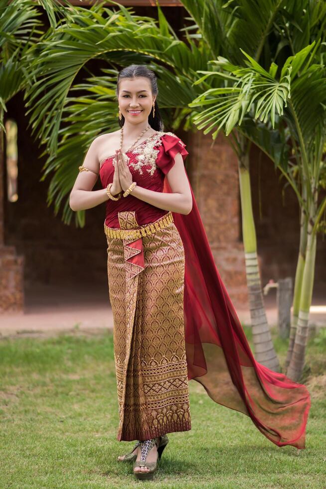 Beautiful Woman wearing typical Thai dress photo