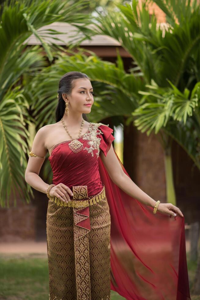 Beautiful Woman wearing typical Thai dress photo