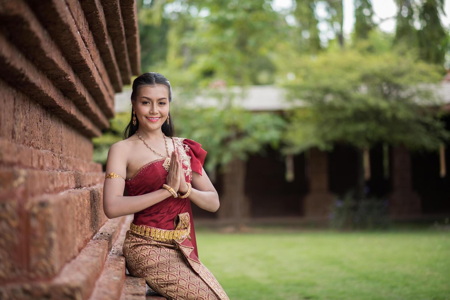 Beautiful Woman wearing typical Thai dress photo