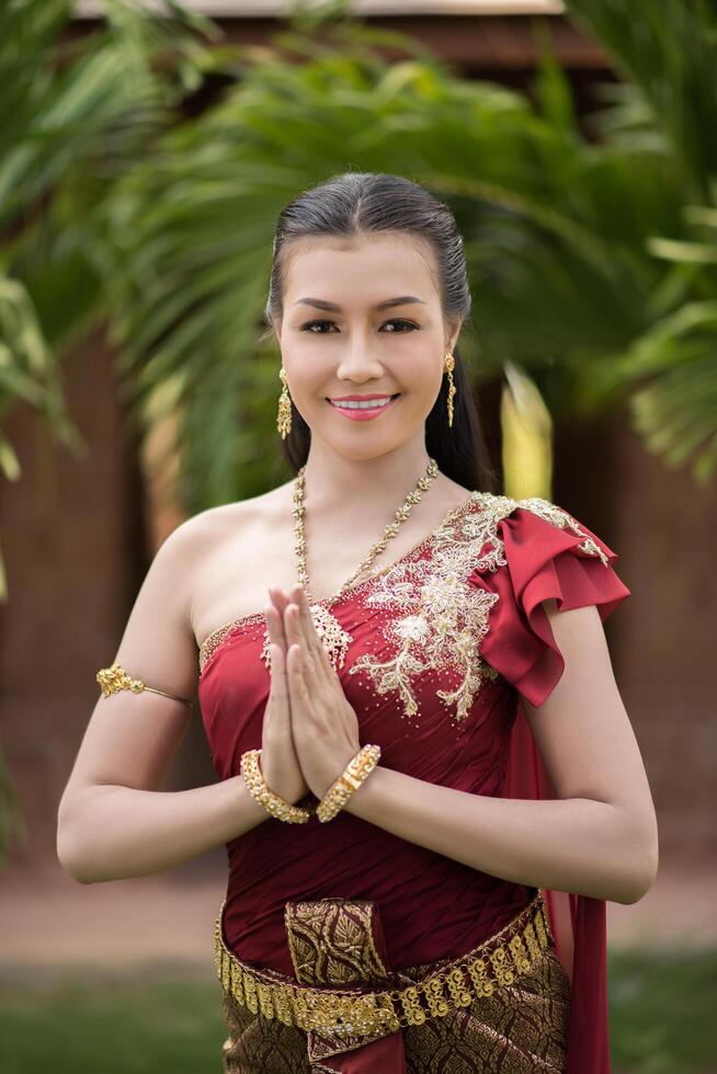 Beautiful Woman wearing typical Thai dress photo