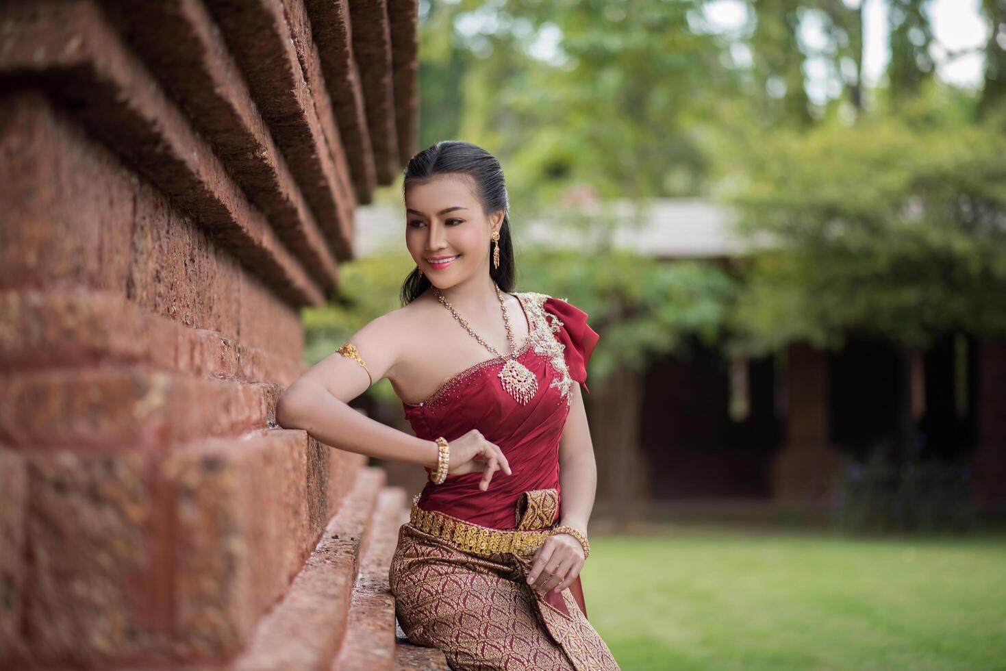 Beautiful Woman wearing typical Thai dress photo