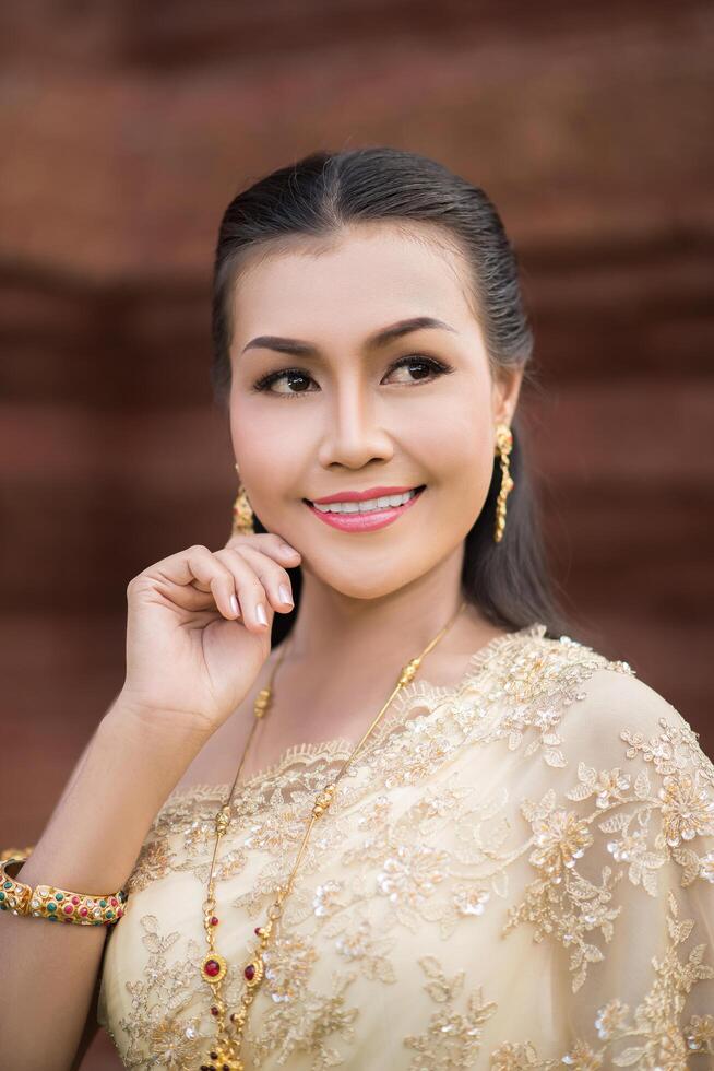 Beautiful Woman wearing typical Thai dress photo