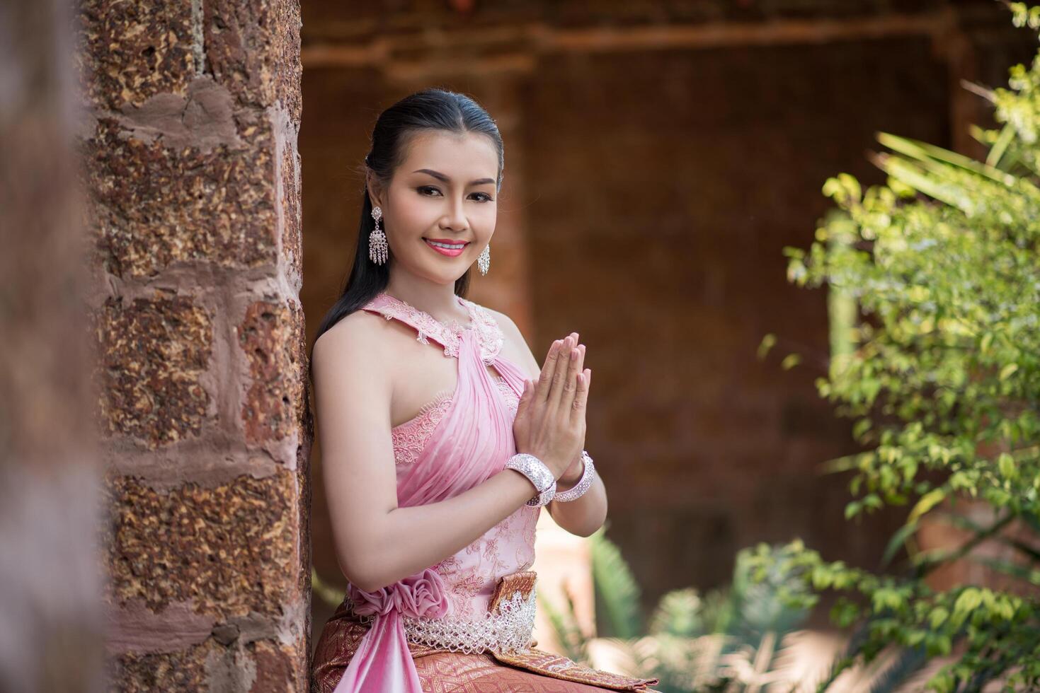 Beautiful Woman wearing typical Thai dress photo