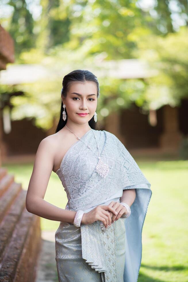 Beautiful Woman wearing typical Thai dress photo