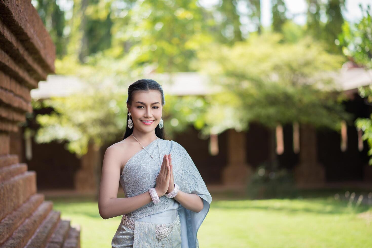 Beautiful Woman wearing typical Thai dress photo