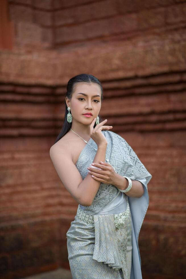 Beautiful Woman wearing typical Thai dress photo