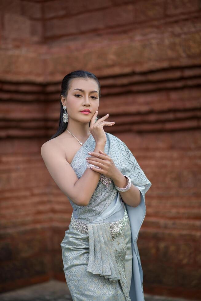 Beautiful Woman wearing typical Thai dress photo