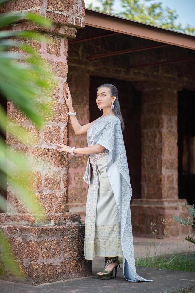 Beautiful Woman wearing typical Thai dress photo