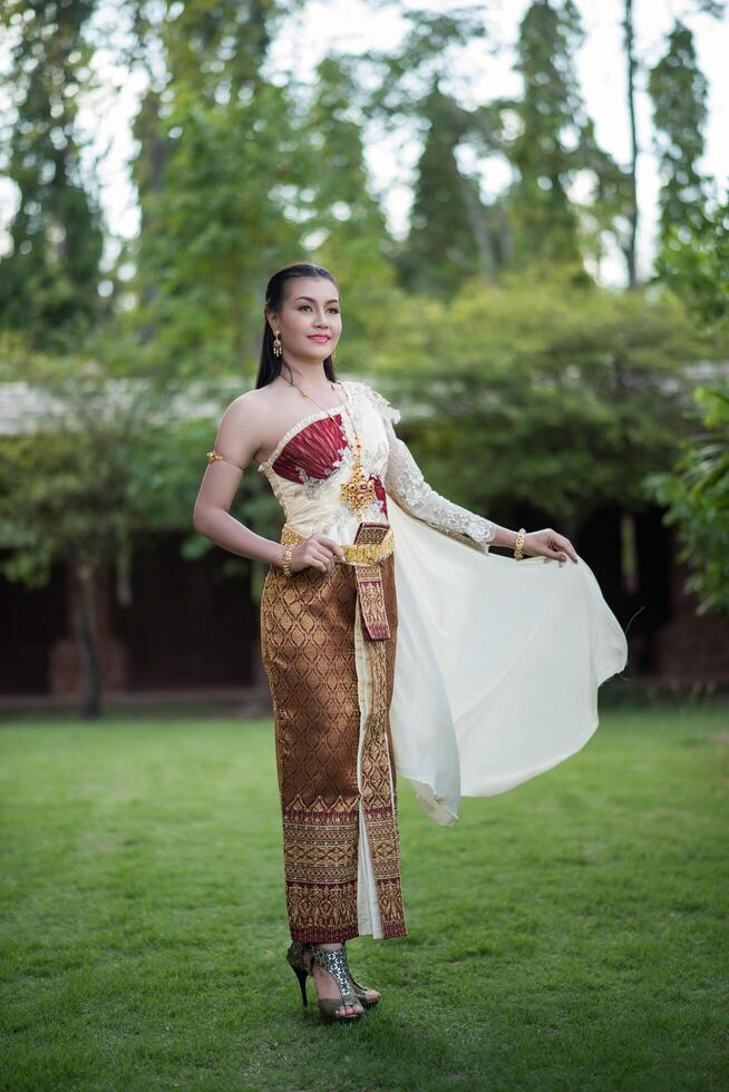 Beautiful Woman wearing typical Thai dress photo