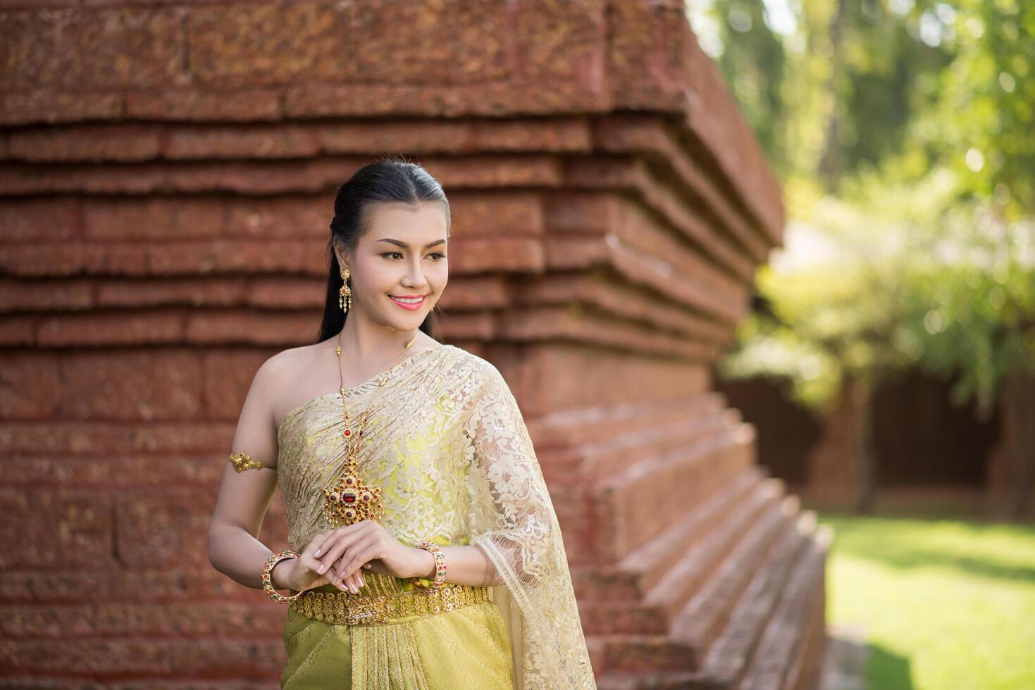 Beautiful Woman wearing typical Thai dress photo