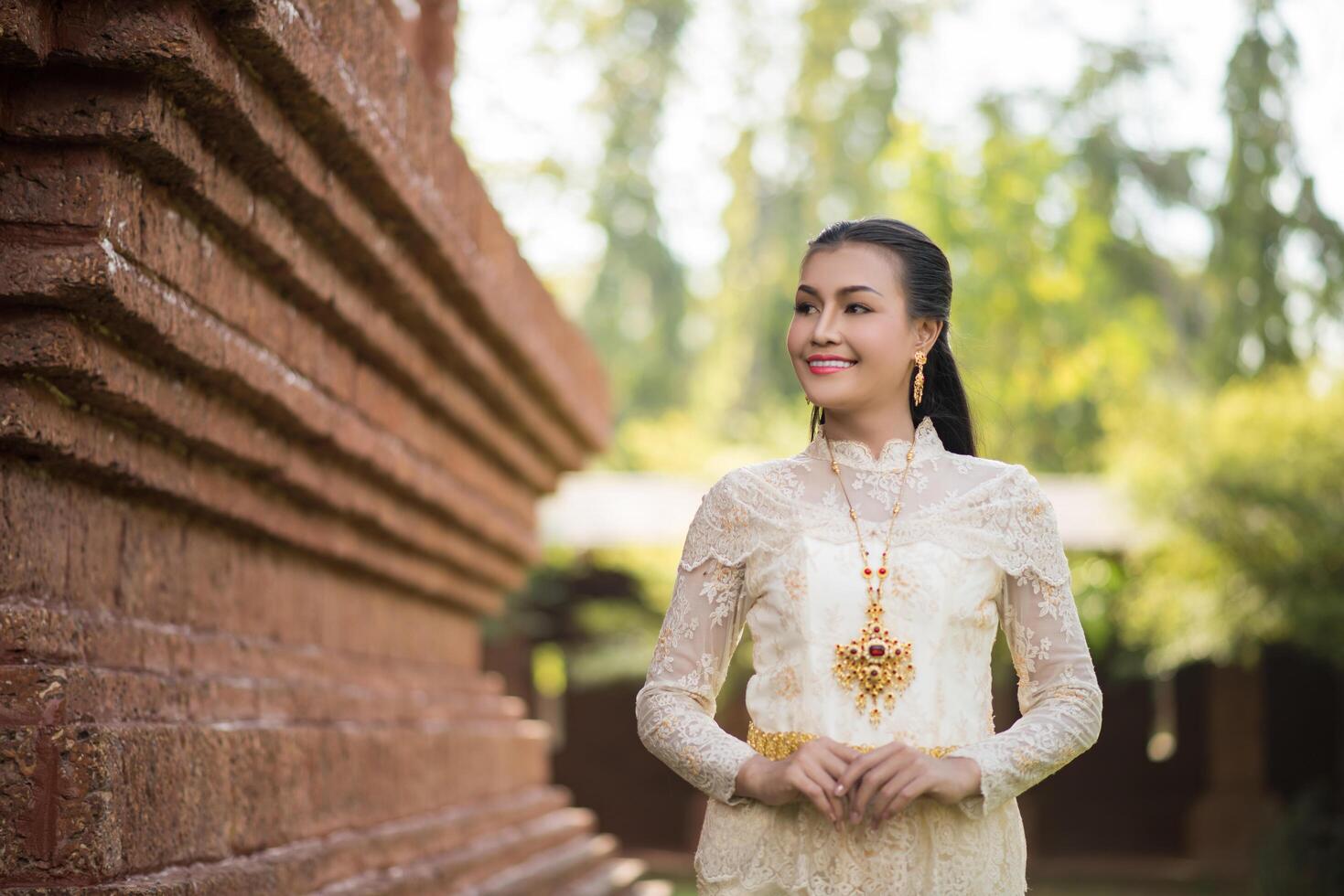 Beautiful Woman wearing typical Thai dress photo