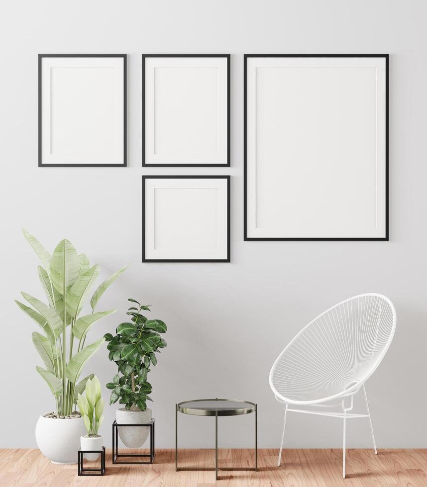 Living room decorated with chairs, Picture Frames and Small Plant Pots photo