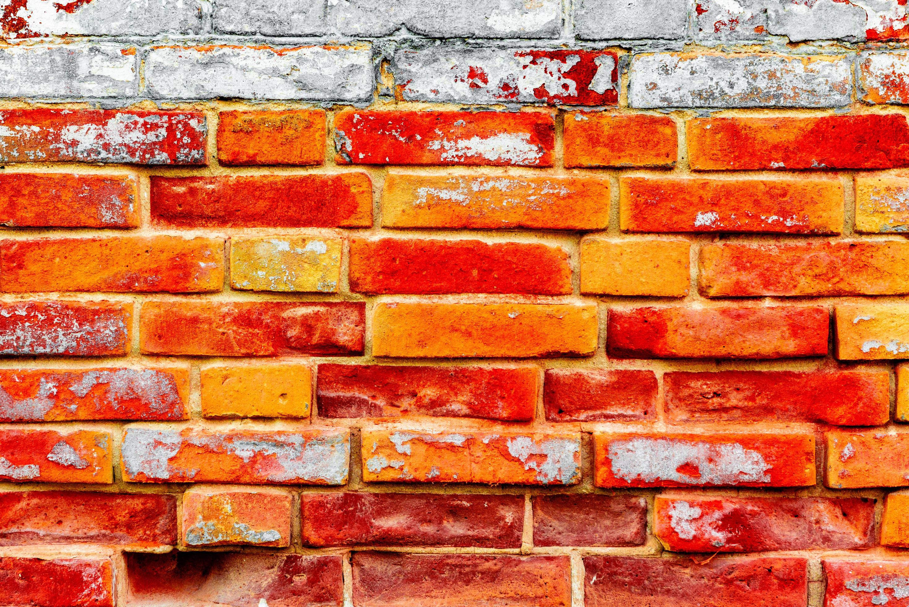 Texture of a brick wall with cracks and scratches 3449637 Stock Photo at  Vecteezy