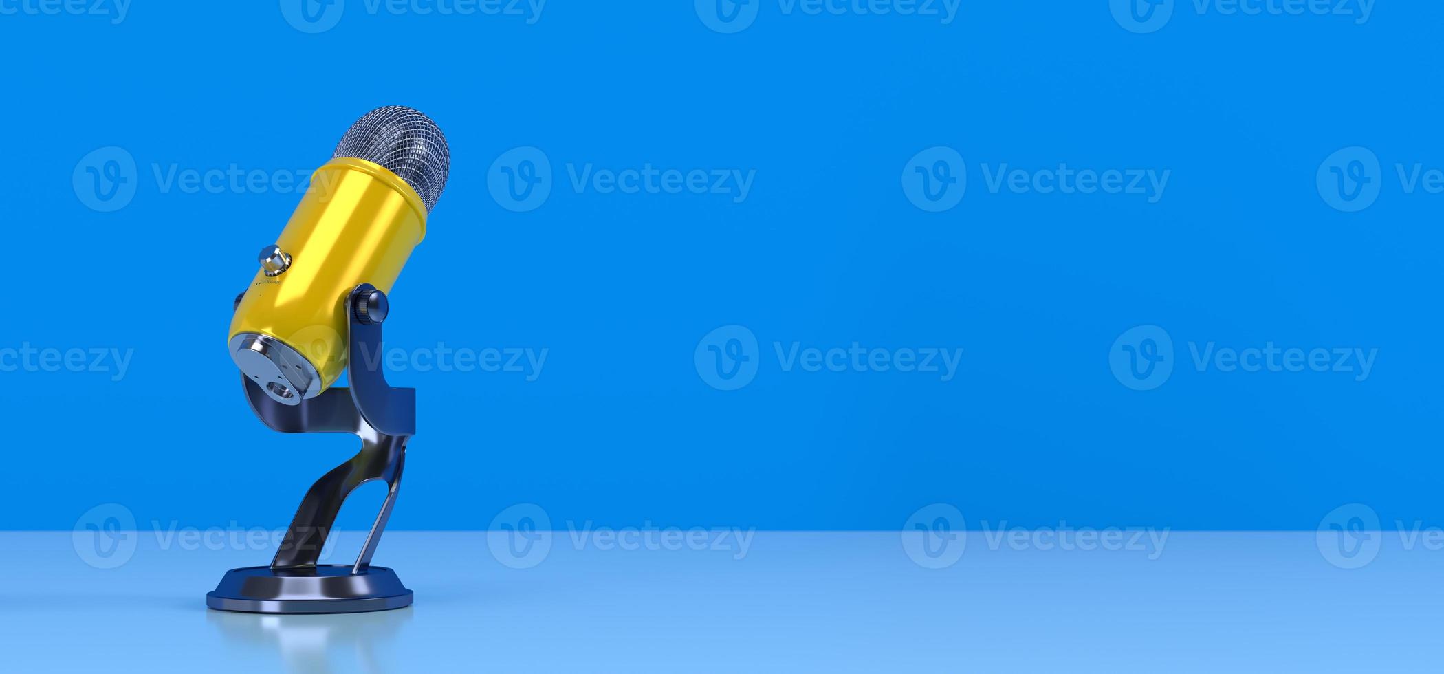 Yellow podcast microphone on blue background photo