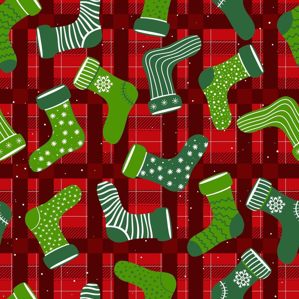 patrón de vector transparente con diferentes calcetines de Navidad.