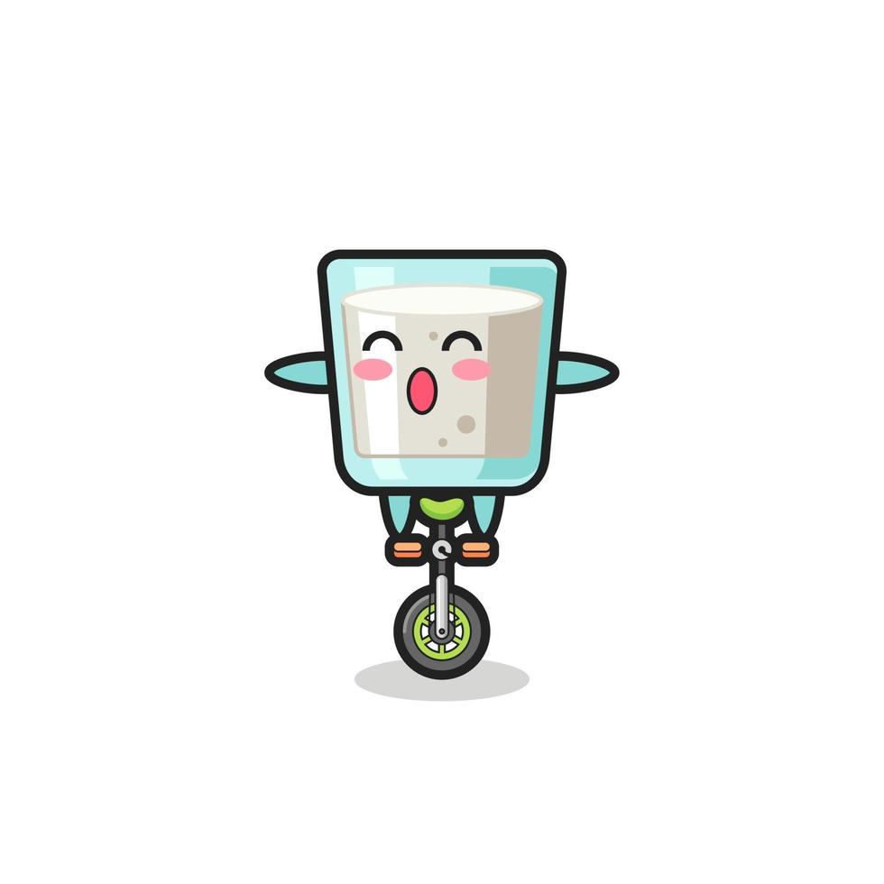 The cute milk character is riding a circus bike vector