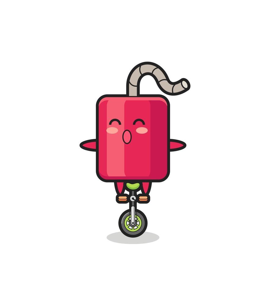 The cute dynamite character is riding a circus bike vector