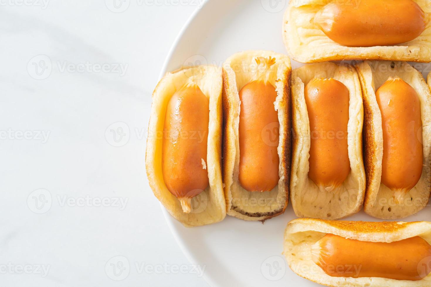 flat pancake roll with sausage photo