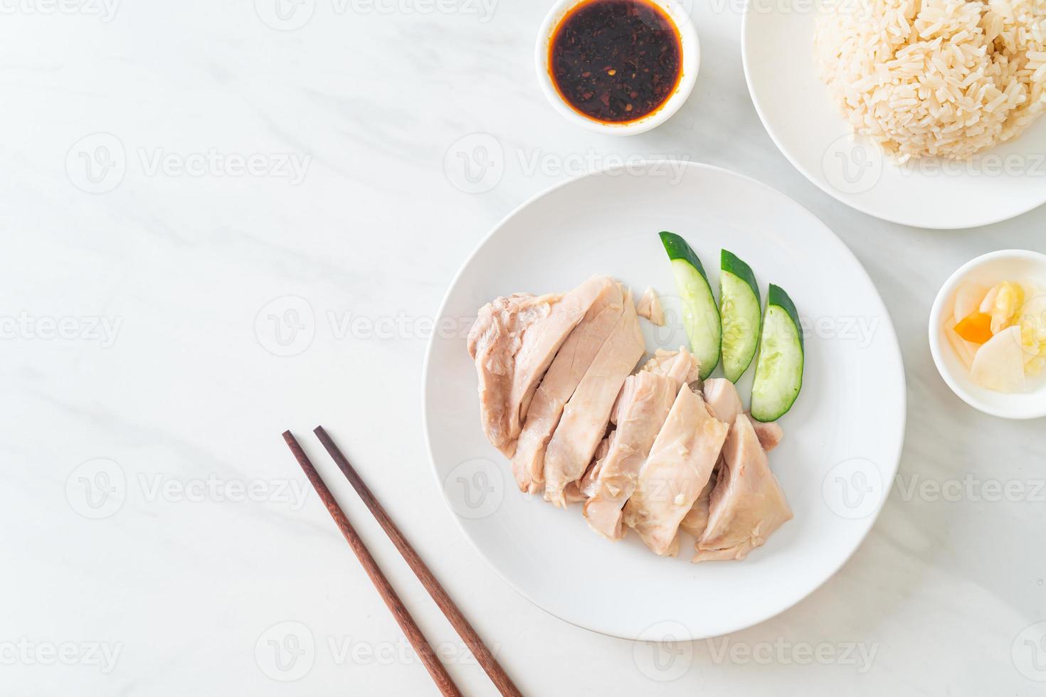 Hainanese chicken rice or rice steamed with chicken soup photo