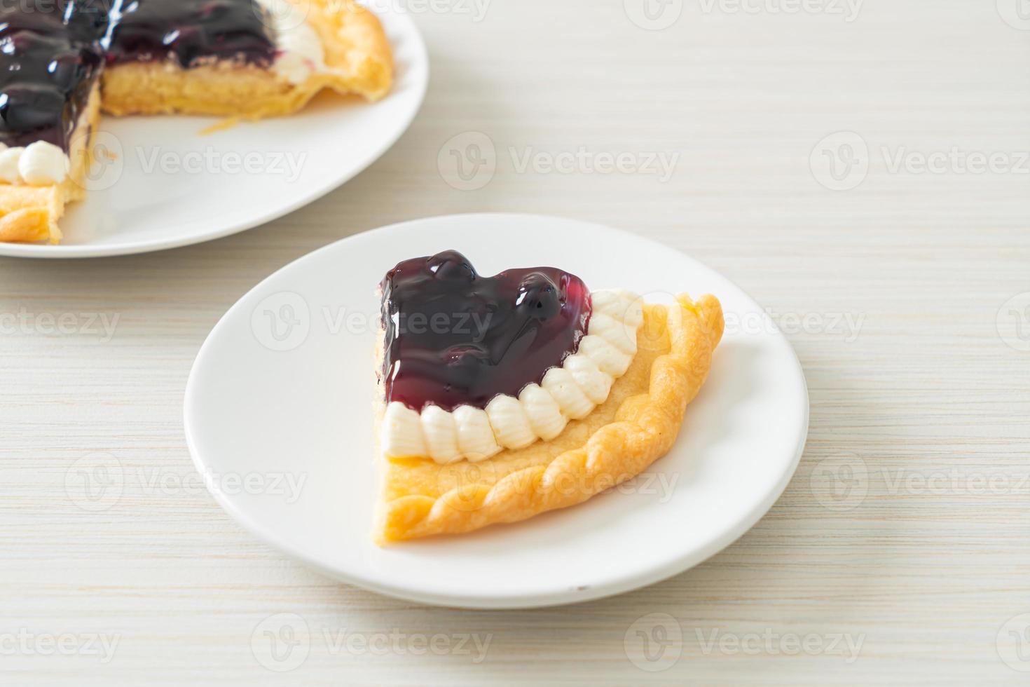 Blueberry Cheese Pie on white plate photo