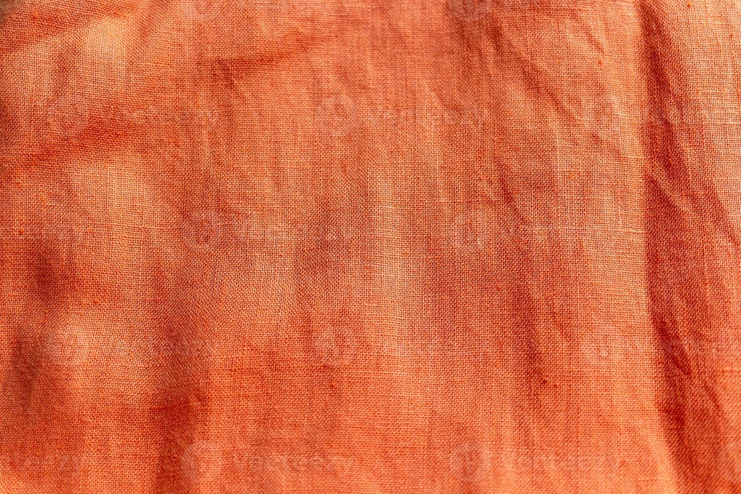 Orange linen fabric texture background photo