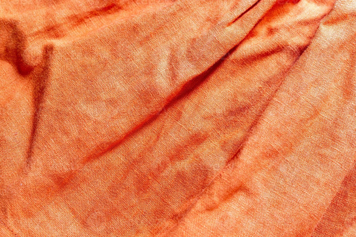 Orange linen fabric texture background photo