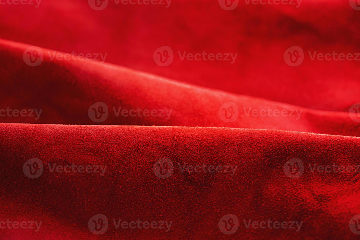 cuero de ante rojo como fondo. textura de terciopelo rojo. foto