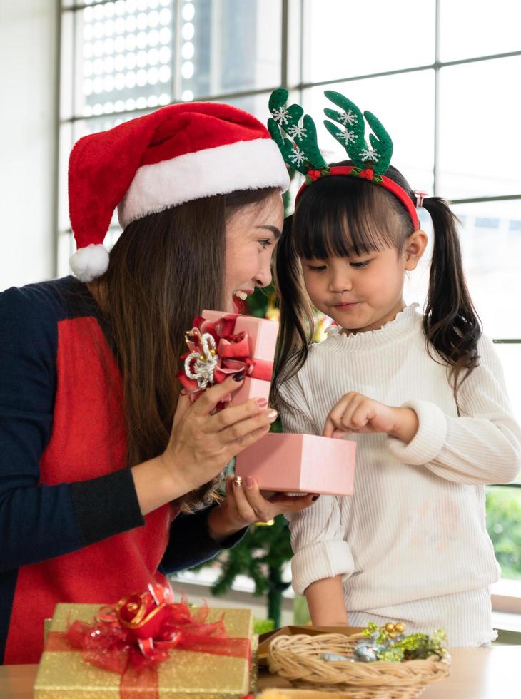 Asian mother and child celebrate christmas festival together photo