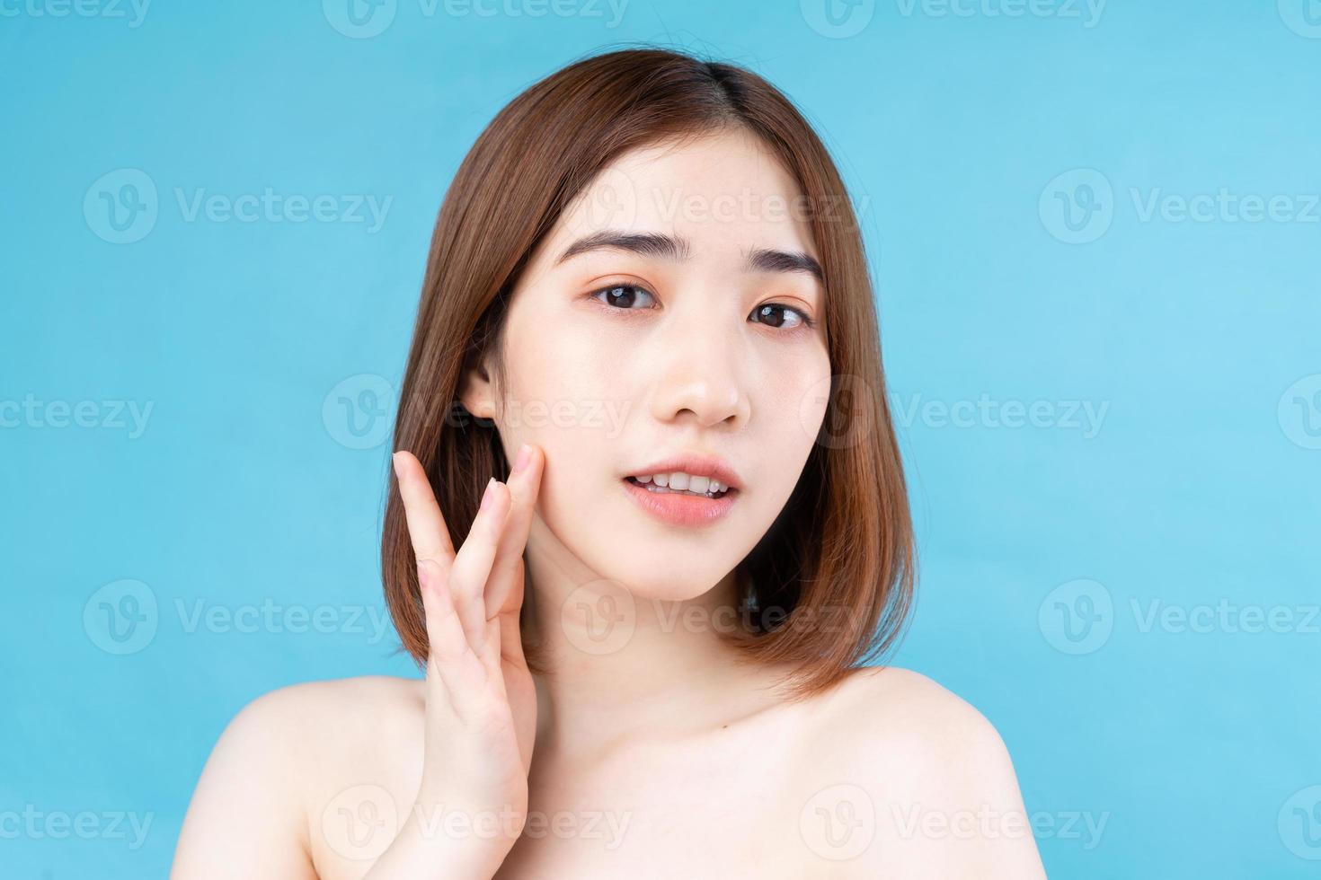 Attractive young Asian woman with youthful skin. photo