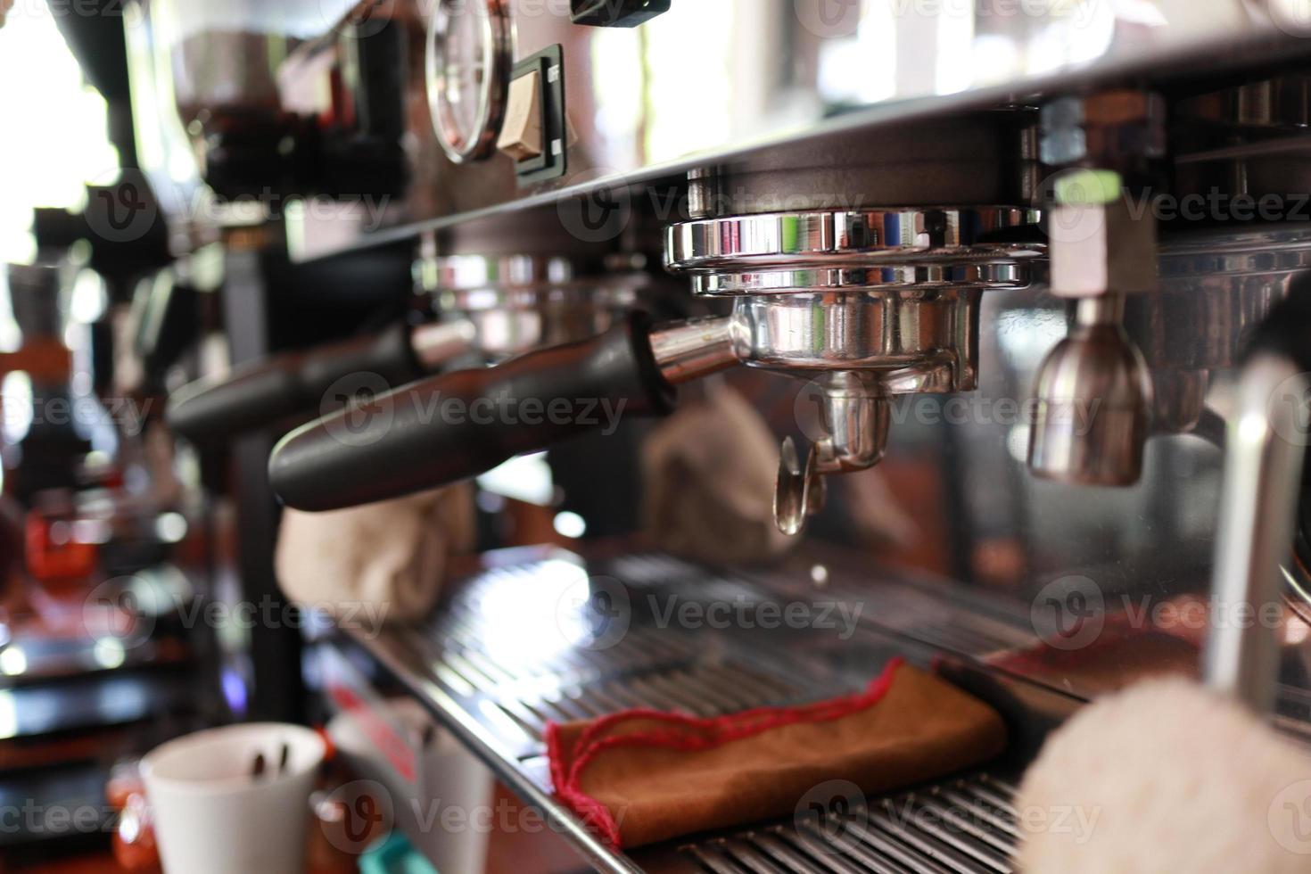 Professional coffee machine makes espresso. photo