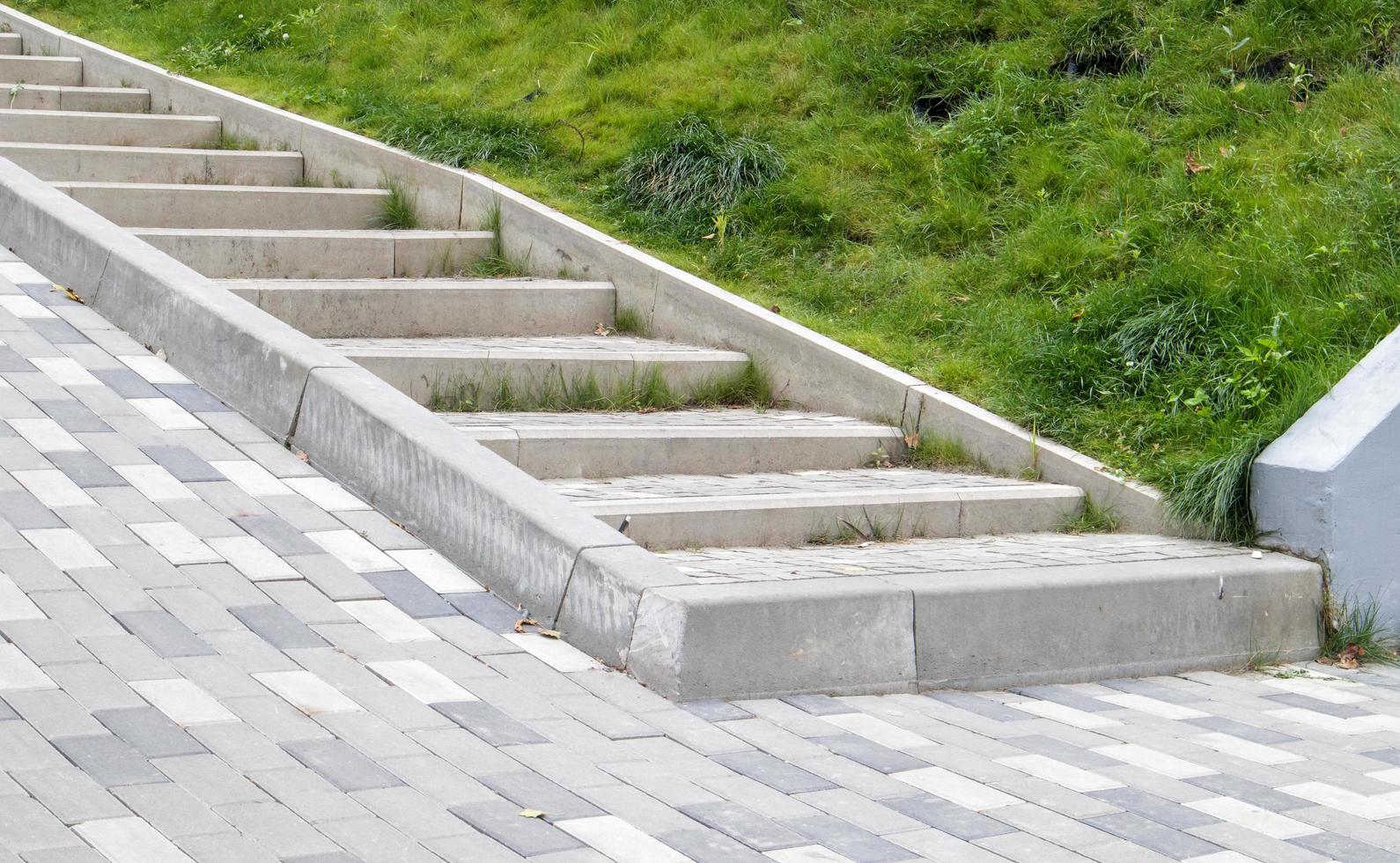Steps from paving slabs and curbs. photo