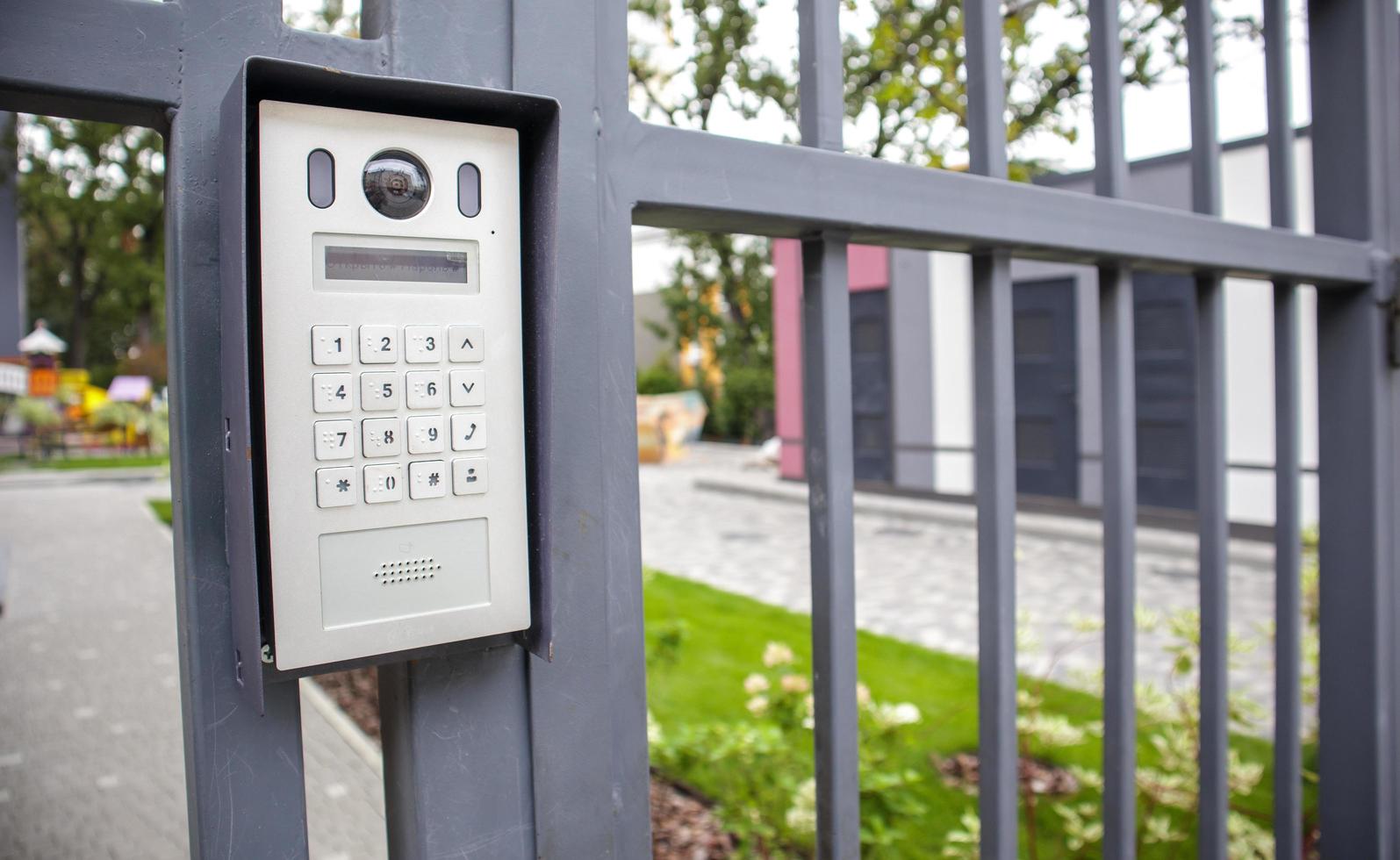 Video intercom on the gate at the entrance to the residential area. photo