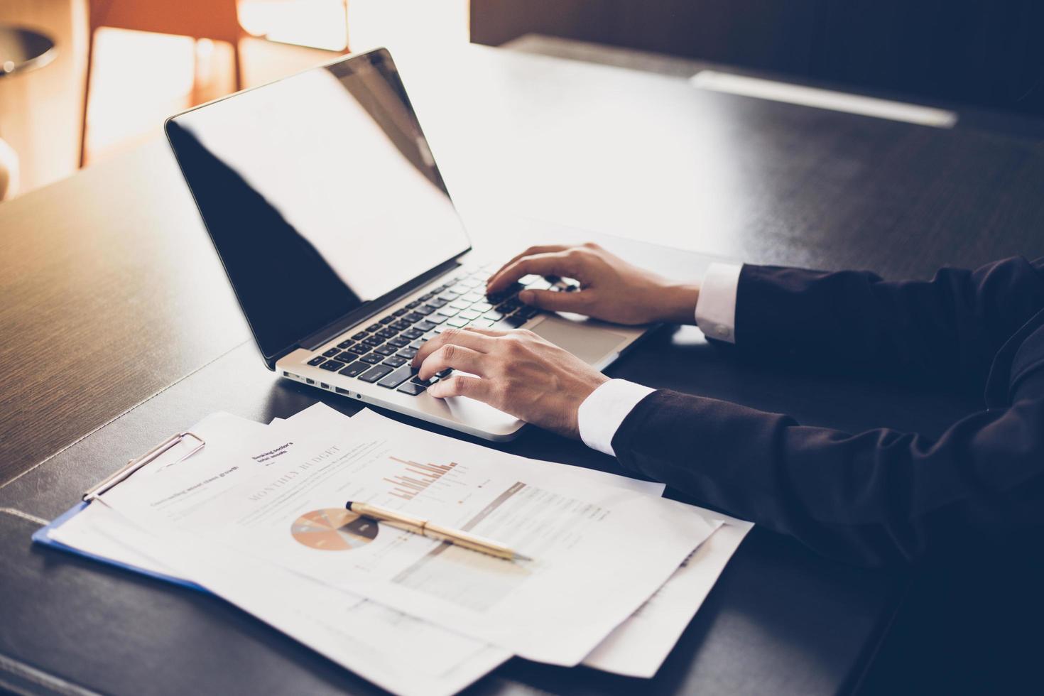 Businesswoman working with notebook in the office photo