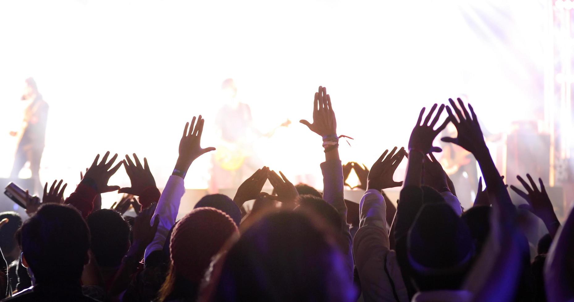 Silhouette of a concert crowd photo